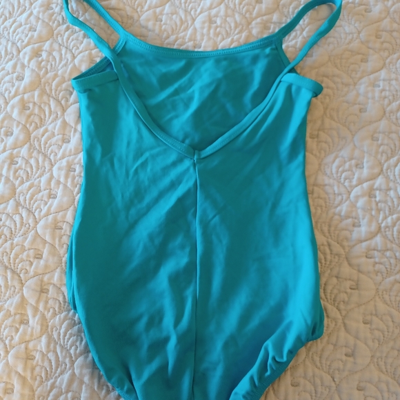 Teal cap sleeve leotard. Size child 6-7.  Like new. - Picture 2 of 3